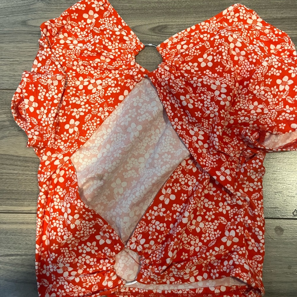 Open back red floral shirt